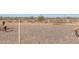 Vacant lot with desert vegetation and rocky ground offering potential building opportunities at Xxx N 158Th Ave, Surprise, AZ 85387