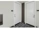 Apartment hallway with unit numbers and neutral decor at 1 E Lexington Ave # 503, Phoenix, AZ 85012