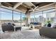 Spacious living room with floor-to-ceiling windows offering abundant natural light and city views at 1 E Lexington Ave # 503, Phoenix, AZ 85012