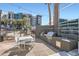 Outdoor pool area with lounging and dining near stainless steel built in grill at 1 E Lexington Ave # 503, Phoenix, AZ 85012