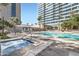 Beautiful outdoor pool and spa area with many lounge chairs at 1 E Lexington Ave # 503, Phoenix, AZ 85012