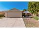 Charming home featuring a two-car garage, well-kept lawn, and inviting curb appeal at 10439 W Saratoga Cir, Sun City, AZ 85351