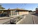 View of the house with backyard garden box at 10450 W Sutters Gold Ln, Sun City, AZ 85351