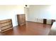 Empty bedroom with hardwood floors and natural light at 10450 W Sutters Gold Ln, Sun City, AZ 85351