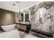 Modern bathroom showcasing dual sinks, marble accents, frameless glass shower, and a soaking tub at 10585 E Crescent Moon Dr # 44, Scottsdale, AZ 85262