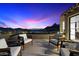 Relaxing rooftop patio offering comfortable seating and breathtaking city and mountain views at 10585 E Crescent Moon Dr # 44, Scottsdale, AZ 85262