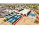 Aerial view of the modern recreation center featuring various activity areas in a community setting at 10718 W Welk Dr, Sun City, AZ 85373