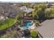 Aerial view of an in-ground pool, backyard with mature landscaping at 1113 E Devon Dr, Gilbert, AZ 85296