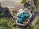 Aerial view of lush backyard, landscaping, and outdoor pool and entertainment area at 1113 E Devon Dr, Gilbert, AZ 85296