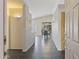 Inviting entryway with dark tile flooring leads to the dining area with abundant natural light at 1113 E Devon Dr, Gilbert, AZ 85296