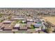 Aerial view of a school featuring colorful playgrounds, well-maintained grounds, and ample parking at 1166 E Del Rio St, Chandler, AZ 85225