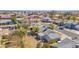 An aerial view of multiple single-Gathering homes with mature trees, and an outdoor living space in the back at 1166 E Del Rio St, Chandler, AZ 85225