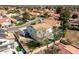 Aerial view of the property showcasing lush landscaping, swimming pool and outdoor living spaces at 1233 E Azure Sea Ln, Gilbert, AZ 85234