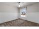 Cozy bedroom with neutral wainscoting and a view to the outdoors at 1233 E Azure Sea Ln, Gilbert, AZ 85234