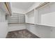 Spacious walk-in closet with ample shelving and hanging space at 1233 E Azure Sea Ln, Gilbert, AZ 85234