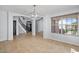 Dining room features tile floors and a large window at 1233 E Azure Sea Ln, Gilbert, AZ 85234