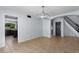 Bright dining room with tile floors open to staircase and kitchen at 1233 E Azure Sea Ln, Gilbert, AZ 85234