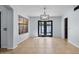 Bright dining room with tile floors and door to back patio at 1233 E Azure Sea Ln, Gilbert, AZ 85234