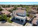 Charming two-story home with a three car garage, beautiful tile roof, and manicured front yard at 1233 E Azure Sea Ln, Gilbert, AZ 85234