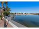 Beautiful waterfront view with a dock and boats, offering picturesque scenery and a relaxing atmosphere at 1233 E Azure Sea Ln, Gilbert, AZ 85234