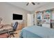 Bedroom featuring a wooden dresser, storage, and an open closet at 1356 E Penedes Ct, Gilbert, AZ 85298