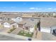 Immaculate single-story home with manicured desert landscaping, a two car garage, and a neutral color palette at 1356 E Penedes Ct, Gilbert, AZ 85298