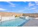 Pool features a built-in spa and tranquil water feature at 1356 E Penedes Ct, Gilbert, AZ 85298