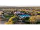 Aerial view of a community pool showcasing lounge seating and manicured landscaping, perfect for relaxation and socializing at 14257 W Harvard St, Goodyear, AZ 85395