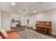 Open-concept living space flows into a modern white kitchen, great for entertaining and Gathering life at 1506 E Gemini Dr, Tempe, AZ 85283