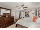 Tastefully decorated main bedroom with stylish furniture, soft lighting, and wood-look flooring at 1506 E Gemini Dr, Tempe, AZ 85283