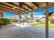 Covered patio overlooking the pool, perfect for outdoor dining at 1506 E Gemini Dr, Tempe, AZ 85283