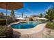 Inviting pool area with ample seating and well-manicured landscaping at 1506 E Gemini Dr, Tempe, AZ 85283