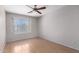Bright bedroom with hardwood floors and a large window provides a clean and comfortable space at 15618 N 12Th Ave, Phoenix, AZ 85023