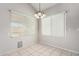 Well-lit dining area featuring neutral walls, tile floor, and a stylish chandelier for comfortable Gathering meals at 15618 N 12Th Ave, Phoenix, AZ 85023