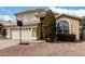 Two-story home featuring a neutral color scheme, two-car garage, tile roof, and well-maintained landscaping at 15618 N 12Th Ave, Phoenix, AZ 85023