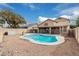 Private pool with desert landscape, surrounded by desert landscaping, near covered patio area at 15618 N 12Th Ave, Phoenix, AZ 85023