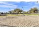 Sandy volleyball court with net in a community park on a sunny day at 1600 N Saba St # 224, Chandler, AZ 85225