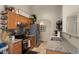 Well-organized kitchen with granite counters, stainless steel appliances, and wood cabinets at 16207 W Moreland St, Goodyear, AZ 85338