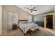 Spacious main bedroom with natural light, vaulted ceiling, and a calming color palette at 16207 W Moreland St, Goodyear, AZ 85338