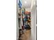 Spacious walk-in closet with ample shelving and hanging space for organized storage at 16207 W Moreland St, Goodyear, AZ 85338