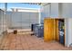 Exterior view of the outdoor patio area with a water heater in an open utility closet at 17200 W Bell Rd # 800, Surprise, AZ 85374