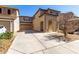 This home has driveway, garage, desert landscaping, and a terracotta tile roof at 17445 N 185Th Dr, Surprise, AZ 85374