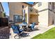 Outdoor patio featuring a round dining table with seating for four, ideal for entertaining guests at 17445 N 185Th Dr, Surprise, AZ 85374