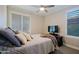 Inviting bedroom with plantation shutters, a ceiling fan, and comfortable decor at 17913 E Vista Desierto --, Rio Verde, AZ 85263