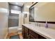 Bathroom featuring updated vanity, commode and tiled shower/tub combo at 18059 W Ocotillo Ave, Goodyear, AZ 85338