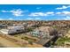 Aerial view of a property with modern pool and outdoor spaces, in a vibrant neighborhood at 20125 E Melissa Pl, Queen Creek, AZ 85142