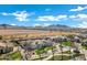 Scenic aerial perspective of a charming neighborhood and house, surrounded by natural beauty and open space at 20125 E Melissa Pl, Queen Creek, AZ 85142