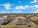 Aerial view of a backyard featuring a private pool, patio area, and landscaping in a residential setting at 20125 E Melissa Pl, Queen Creek, AZ 85142