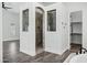 A full bathroom featuring a glass enclosed shower with a stone bench and access to the walk-in closet at 20125 E Melissa Pl, Queen Creek, AZ 85142