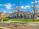 Attractive home with brick driveway and lush landscaping, offering curb appeal and a welcoming atmosphere at 20125 E Melissa Pl, Queen Creek, AZ 85142